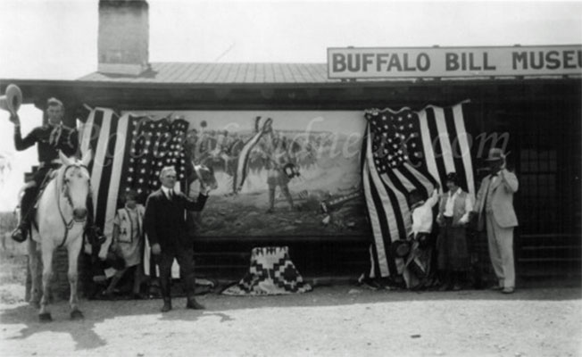 This is a photograph of the unveiling of Lindneux’s strongly criticized and debated depiction of the First Scalp for Custer at the Buffalo Bill Museum in Cody, Wyoming on July 27, 1928.